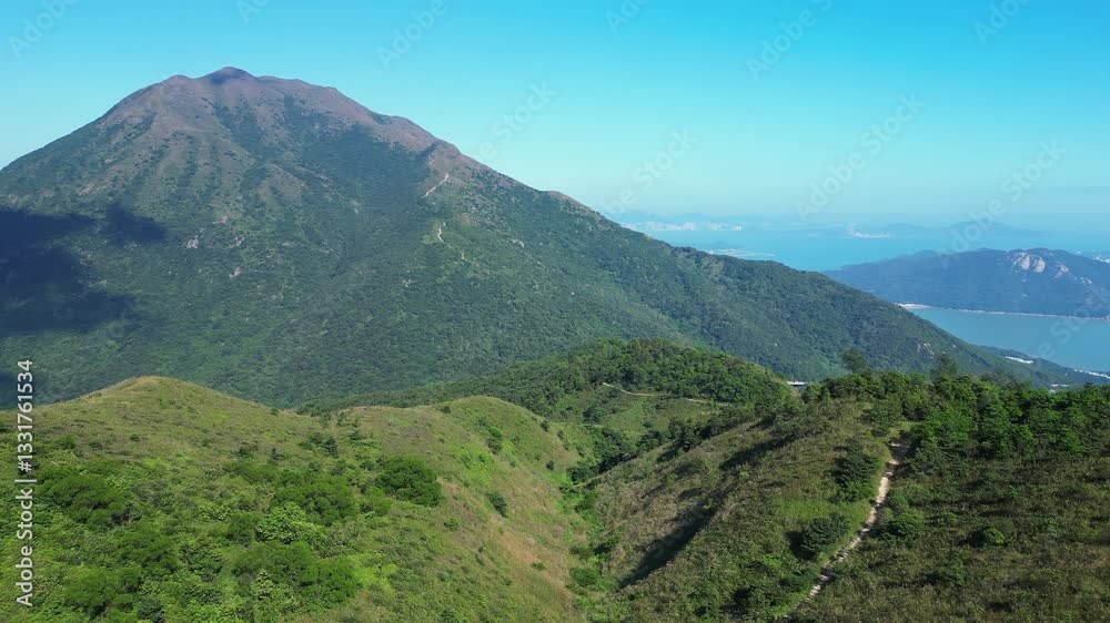 Lantau, Hong Kong: Aerial drone footage of the stunning Sunset peak in the Lantau island in Hong Kong SAR in China. 