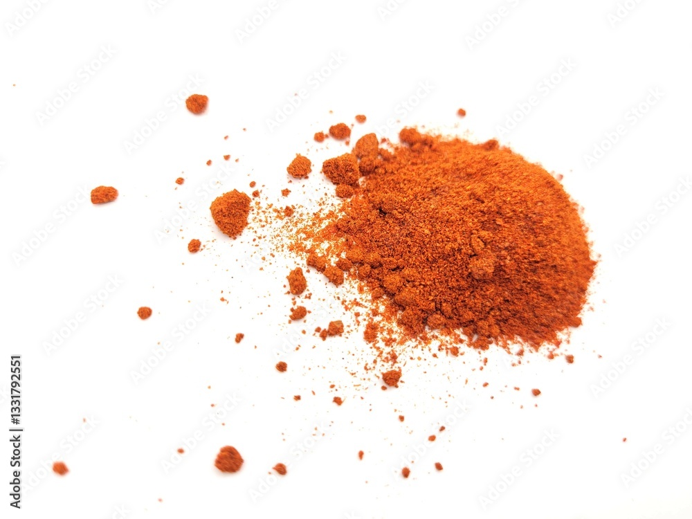 Pile of paprika powder on a white background Pile of paprika powder on a white background