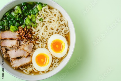 Delicious ramen bowl filled with tender pork, green onions, and
