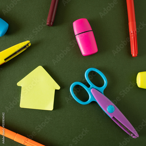 Scissors, markers, felt-tip pens and other school supplies are waiting for students to use them.
