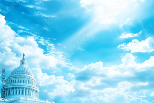 Sunlight illuminating the United States Capitol dome amidst a bright blue sky filled with clouds