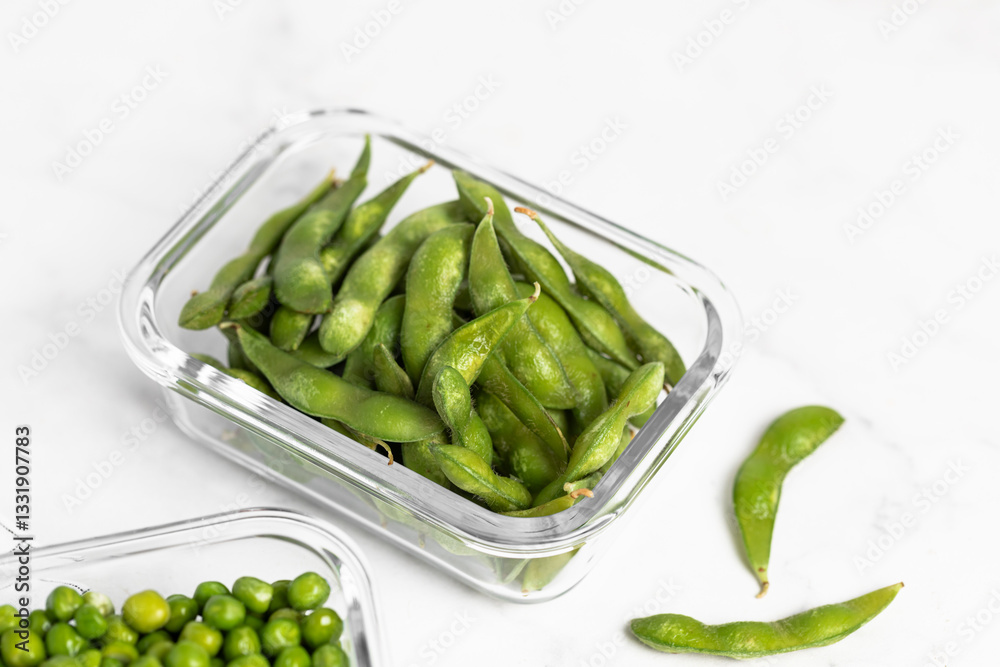 green peas in glass container for storage and cooking, healthy lifestyle, vegetable protein, potassium, fiber green peas in glass container for storage and cooking, healthy lifestyle, vegetable protein, potassium, fiber