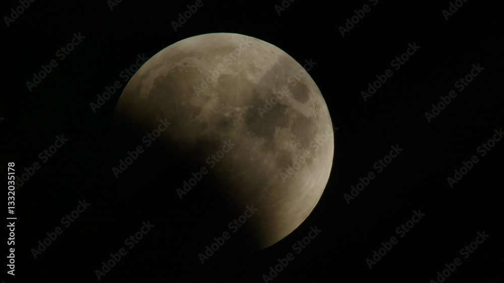 Movement of the full Moon across the sky during the Lunar Eclipse on March 14, 2025. The shadow from the Earth falls on the disk of the Moon. Movement of the full Moon across the sky during the Lunar Eclipse on March 14, 2025. The shadow from the Earth falls on the disk of the Moon.