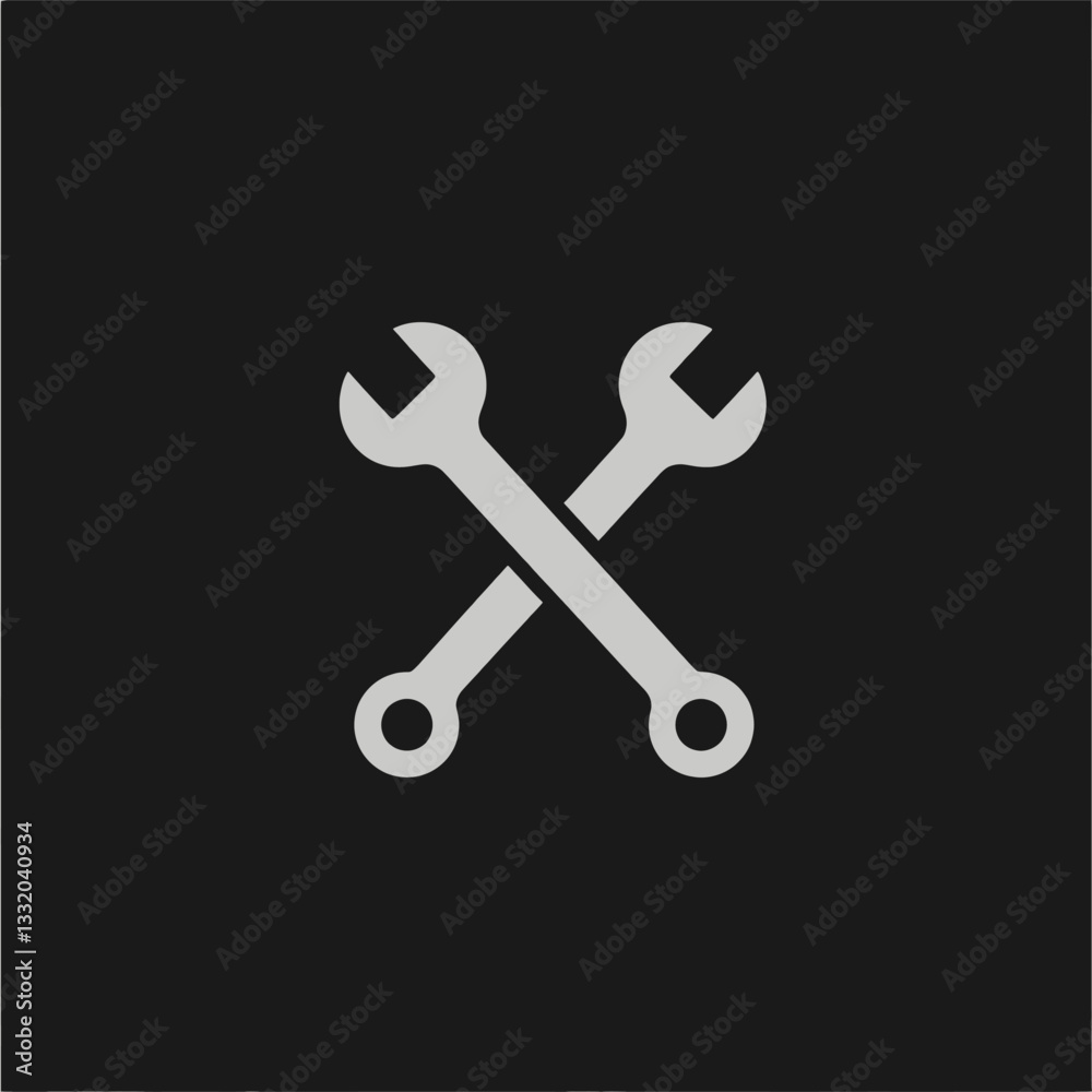 Crossed silver wrenches on black background Crossed silver wrenches on black background