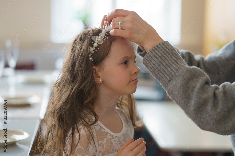 Naklejka premium A girl in white dress wearing a tiara. Children Party concept