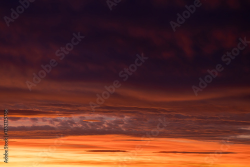 Sunrise sky with pink and orange clouds