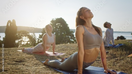 Experience the tranquility of outdoor yoga practice at sunset, surrounded by serene natures beauty
