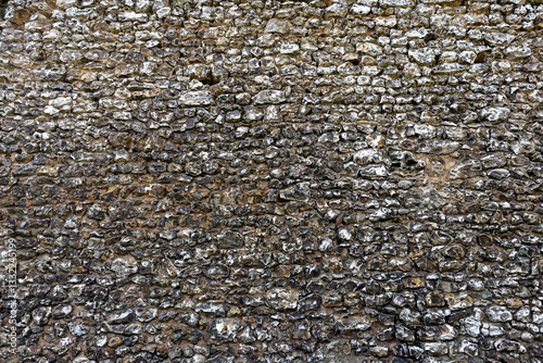 Stein Mauer aus behauenen Feuersteinen