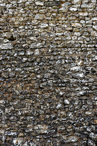 Stein Mauer aus behauenen Feuersteinen