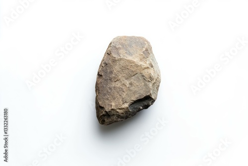 Stone tool on white background exhibiting primitive craft. Neural network AI generated