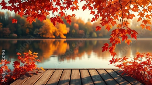 An autumn scene with vibrant orange and red leaves on tree branches framing a calm lake, a rustic wooden deck or table in the foreground, and blurred autumn foliage reflecting in the water