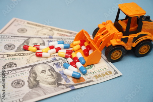 Euro banknotes and an excavator loading a handful of capsule tablets. Pharmaceutical business. Medicines. Spending on healthcare.