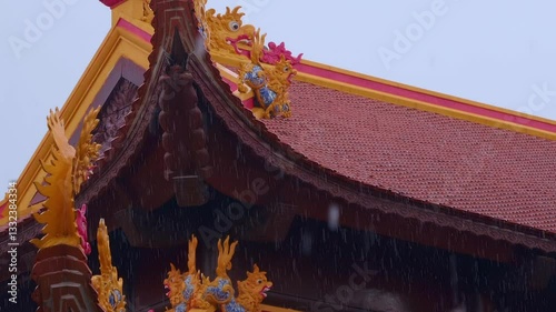 Kirins and dragons curved in wooden roof of the Thang Nghiem Pagoda. Mythical creatures protecting the Buddhist temple in Hanoi Vietnam
