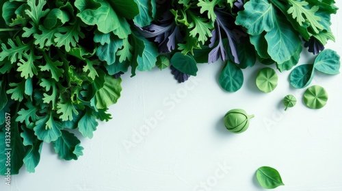 Fresh Green Leafy Vegetables and Herbs on White Background for Healthy Eating