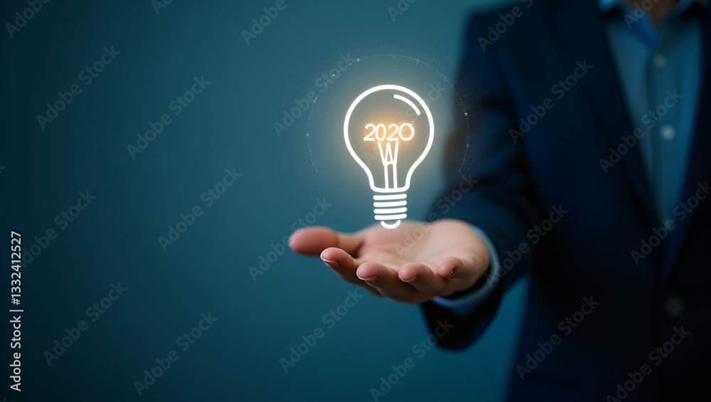 Hand Interacting with Holographic 2026 Business Goals Interface: Lightbulb & Target Symbol for Future Strategies