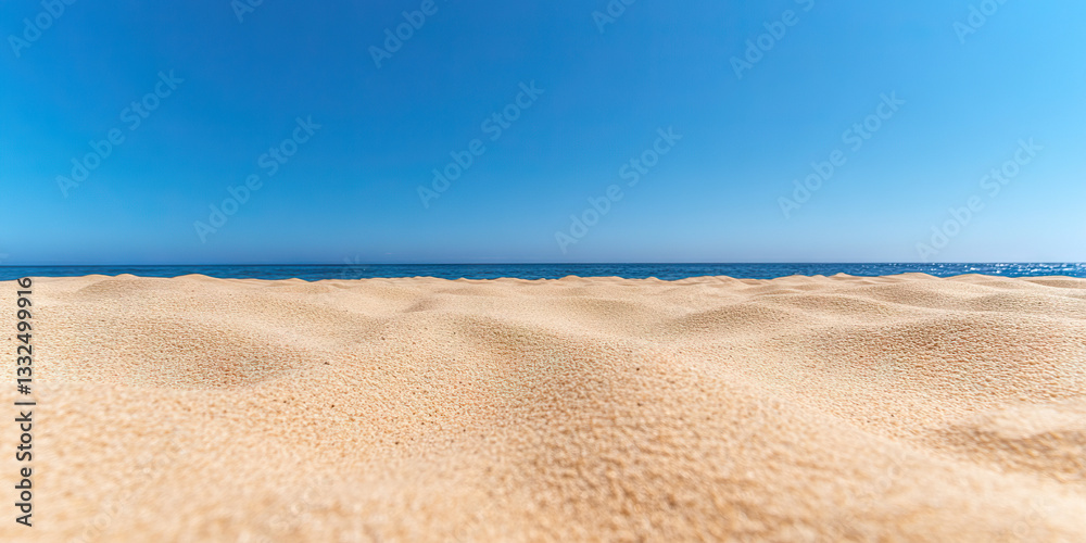 Beach Sand and Ocean Horizon under Clear Sky