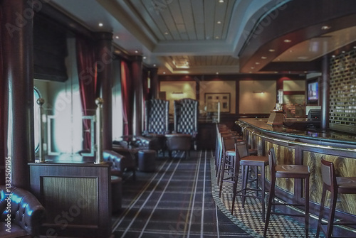 Obraz na płótnie Cozy living room atmosphere inside English British pub bar lounge bistro onboard luxury cruiseship cruise ship ocean liner in contemporary Art Deco interior design w salonie