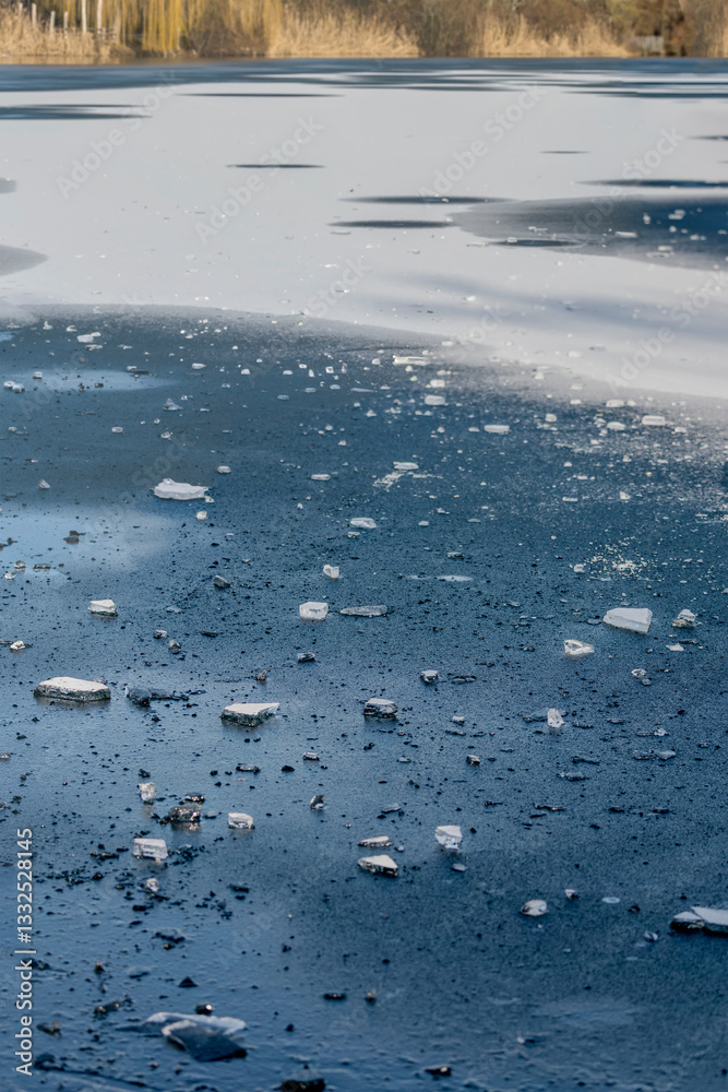 ice splinters on frozen lake Max-Eyth-See, Stuttgart, Germany