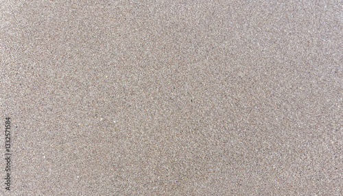 Photos Detailed view of sandy beach texture showcasing fine grain patterns and natural