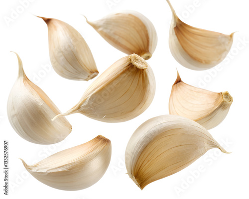 A Collection of Fresh Garlic Cloves Floating in Mid-Air – Aromatic and Flavorful