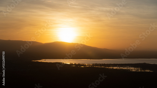 Experiencing a Serene and Beautiful Sunset Over Majestic Mountains and a Calm Waterbody Lake Manyara Tanzania Africa