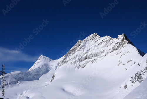 a snow-covered Swiss mountain range
