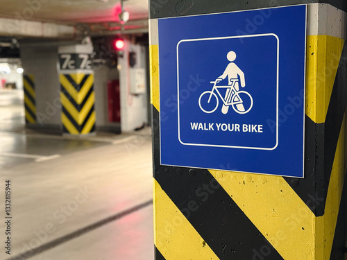 Walk Your Bike Sign in Underground Parking Garage
