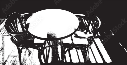 Round table and chairs in bright sunlight
