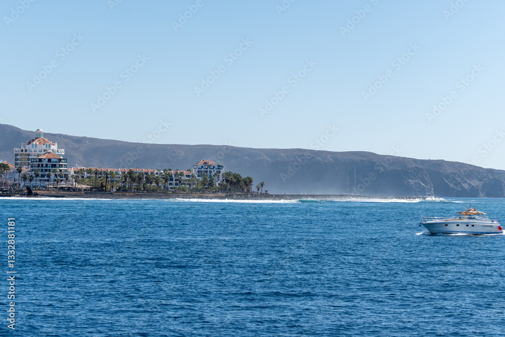 Hotels, resorts, beaches on South of Tenerife in Costa Adeje and Playa de las Americas, Canary islands, Spain in winter, view from ocean Hotels, resorts, beaches on South of Tenerife in Costa Adeje and Playa de las Americas, Canary islands, Spain in winter, view from ocean