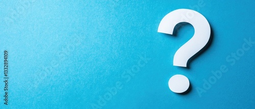 A White Question Mark Against a Light Blue Background