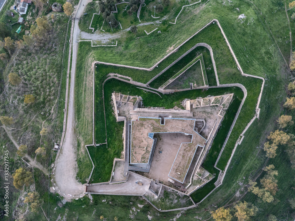 Aerial view of Fort San Cristobal in Badajoz commanding the high ground above the town, with moat and ravelin