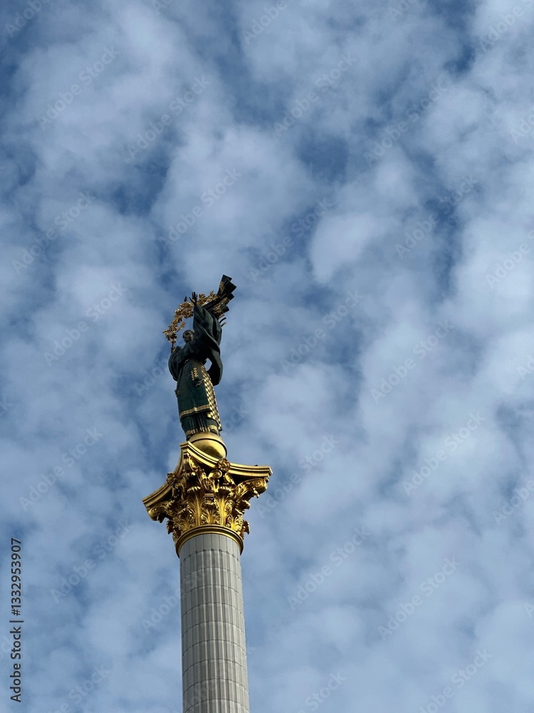 Fototapeta premium Kyiv statue church sky Beautiful