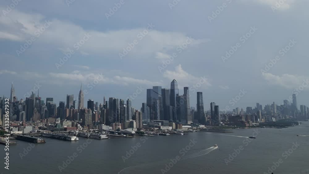 aerial view of new york city skyline (midtown and downtown) from across the hudson river in west jersey (weehawken ferry skyscraper tall building towers) scenic travel tourism destination aerial view of new york city skyline (midtown and downtown) from across the hudson river in west jersey (weehawken ferry skyscraper tall building towers) scenic travel tourism destination