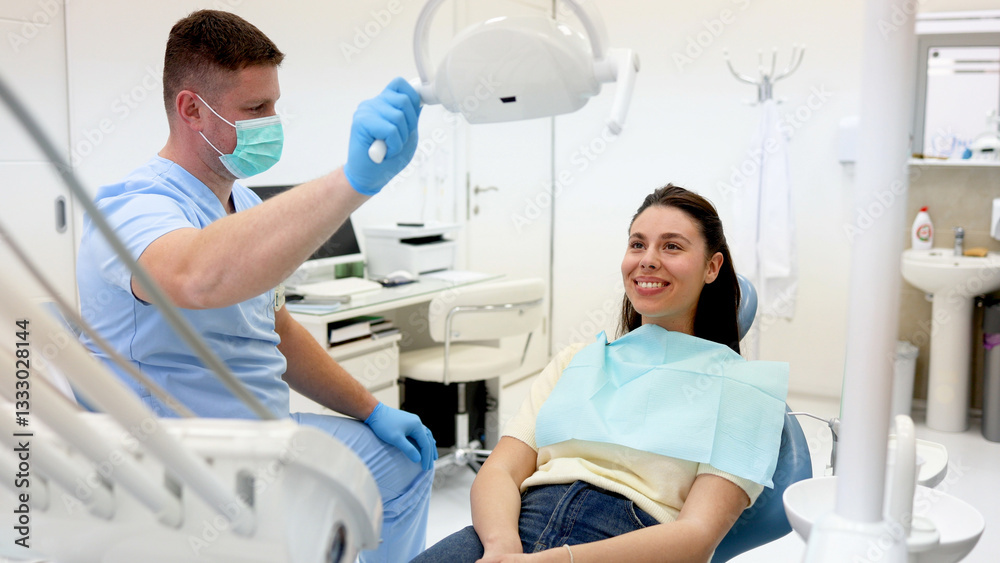 Fototapeta premium Young woman sitting on a dental chair