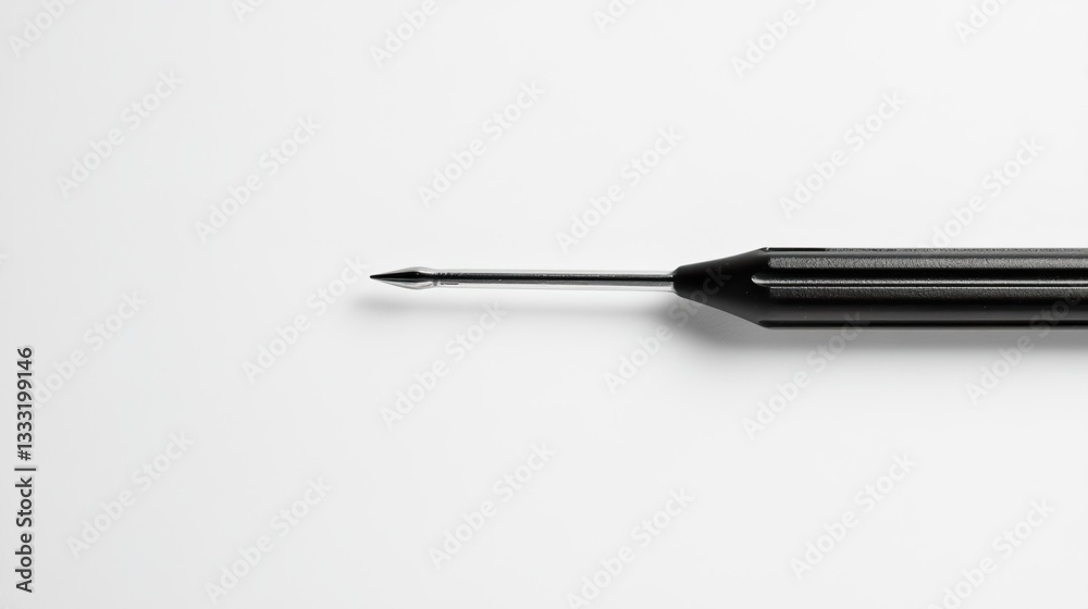 A single screwdriver, showcasing simplicity and precision in design. A single screwdriver, showcasing simplicity and precision in design.