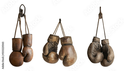 Vintage boxing gloves hanging in a rustic setting, showcasing the history and craftsmanship of the sport