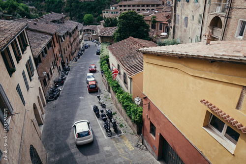 Fototapeta Naklejka Na Ścianę i Meble -  The scenic view of the streets and architecture of the ancient city of Siena in Tuscany, Italy