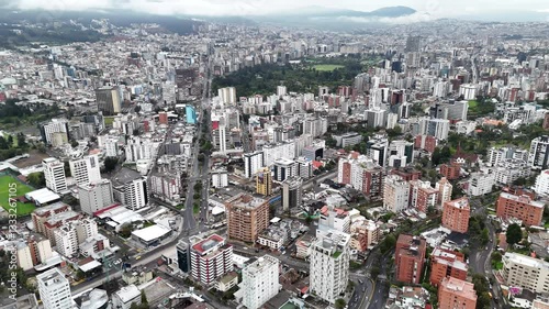 Aerial footage of the city Quito in Ecuador with the Volcan mountain on background