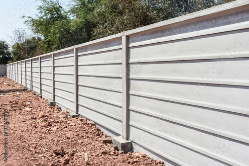 Prefabricated or precast concrete fence for Housing project or farm land,selective focus.