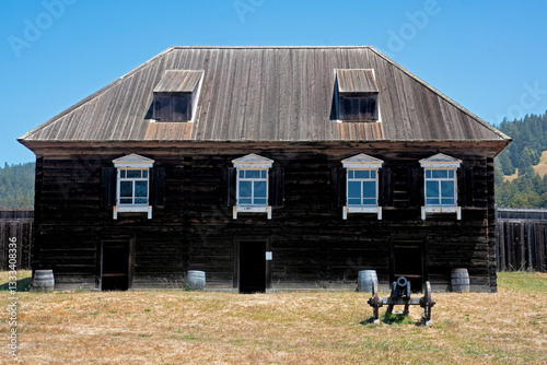 An intriguing image of a historic fort featuring a cannon, evoking a sense of the past and the military significance in a natural, open landscape.