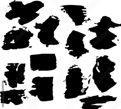 
set of brush strokes spots black on white