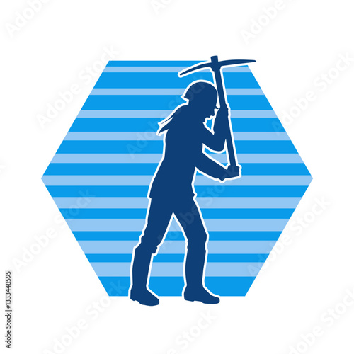 Silhouette of a construction worker in action with a pick axe tool. Silhouette of a miner labour in heavy duty work.