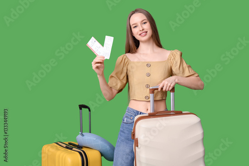 Happy young woman with lugg...