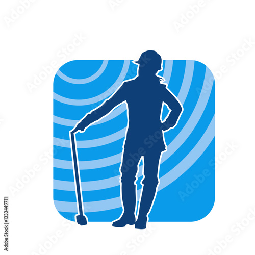 Silhouette of a worker in action pose using his sledge hammer tool.
