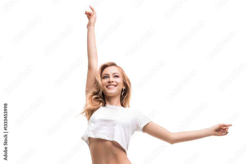 Fototapeta premium Young woman joyfully dancing against a bright background in casual attire