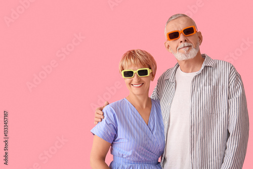 Mature couple in sunglasses...