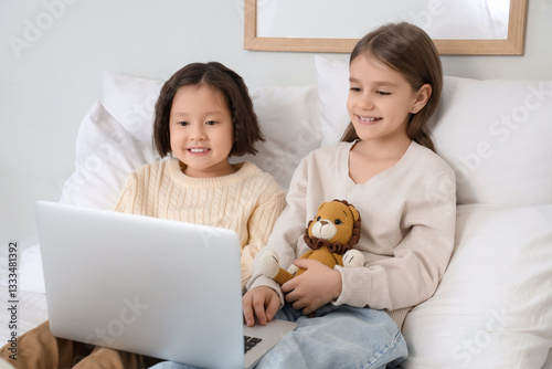 Cute girls watching cartoon...