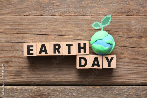 Text EARTH DAY with plastic...