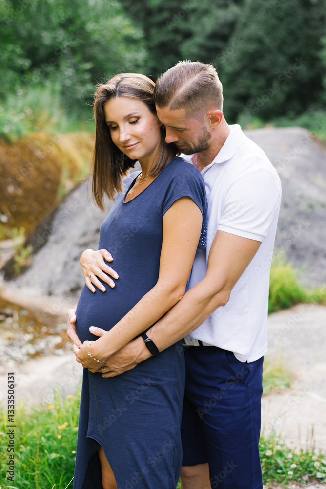 Fototapeta premium Loving Couple Waiting For Baby Outdoors In Summer