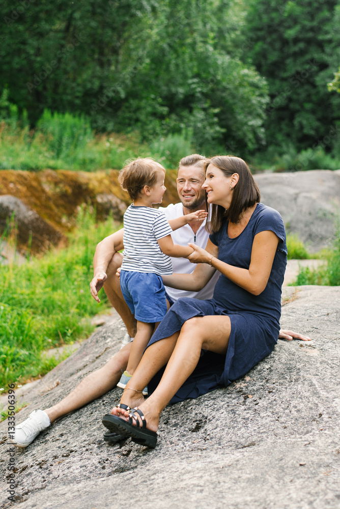 Happy Family Smiling Together In Summer Nature Outdoors